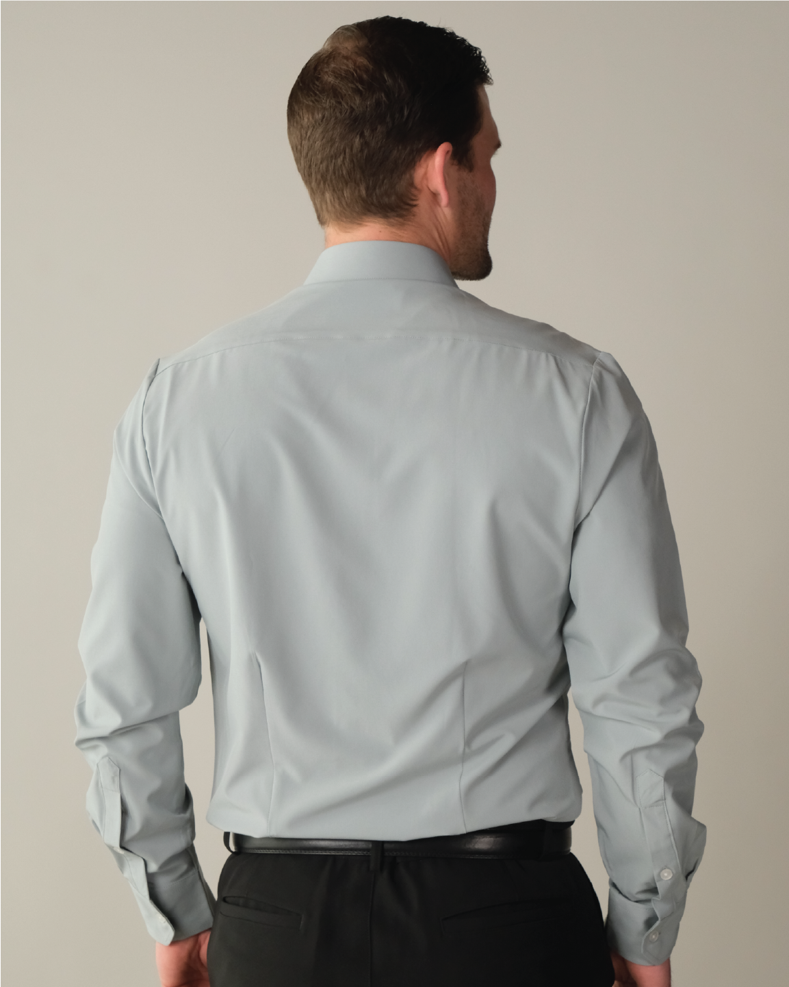 Mean wearing A grey dress shirt