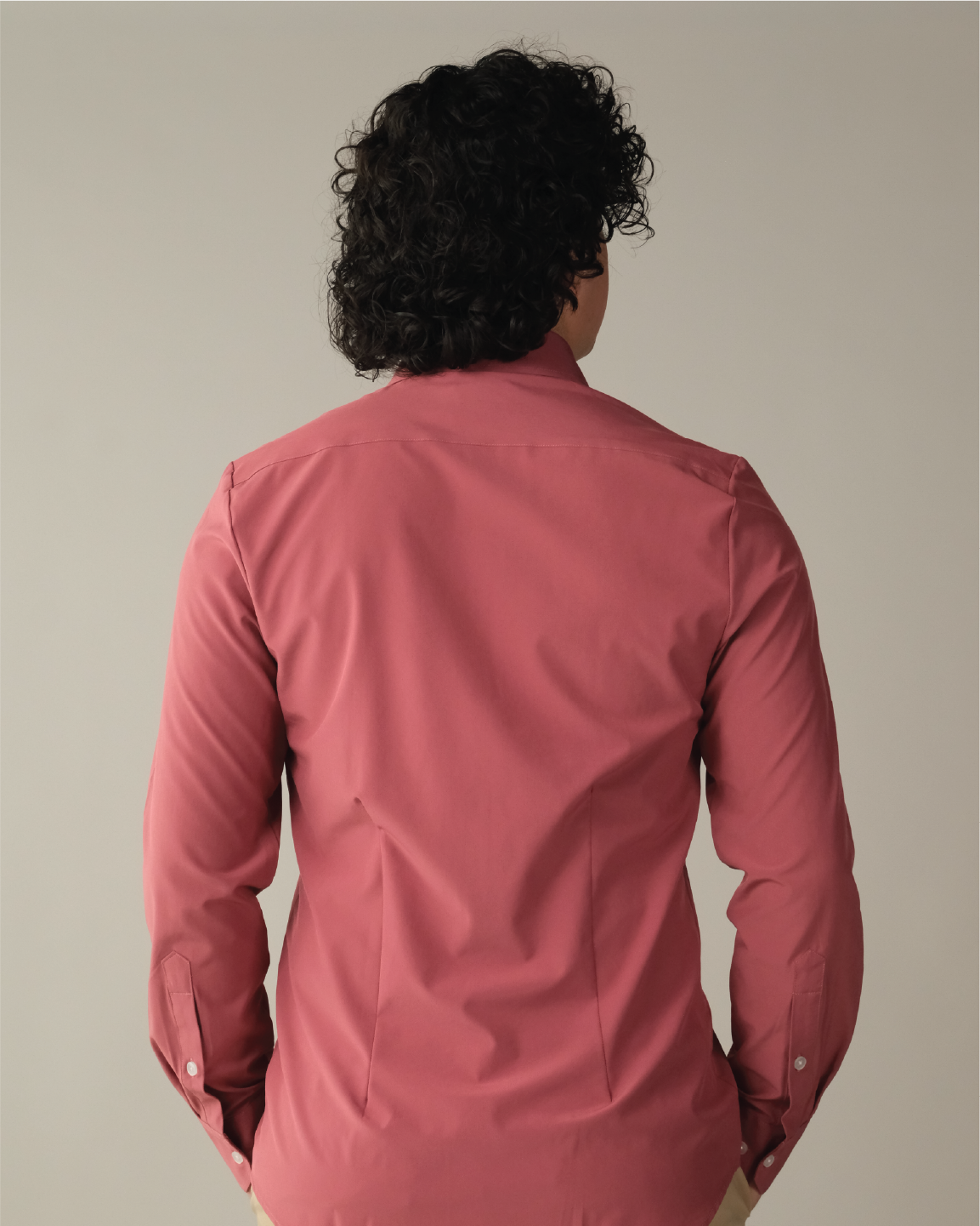 Man wearing an adobe red shirt