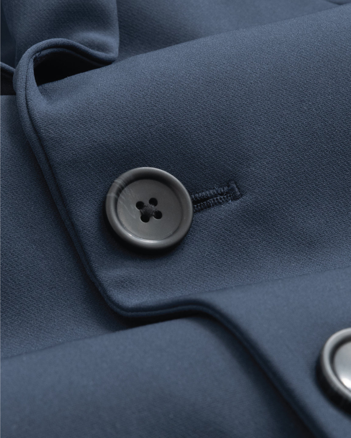 Midnight blue blazer with dark navy buttons