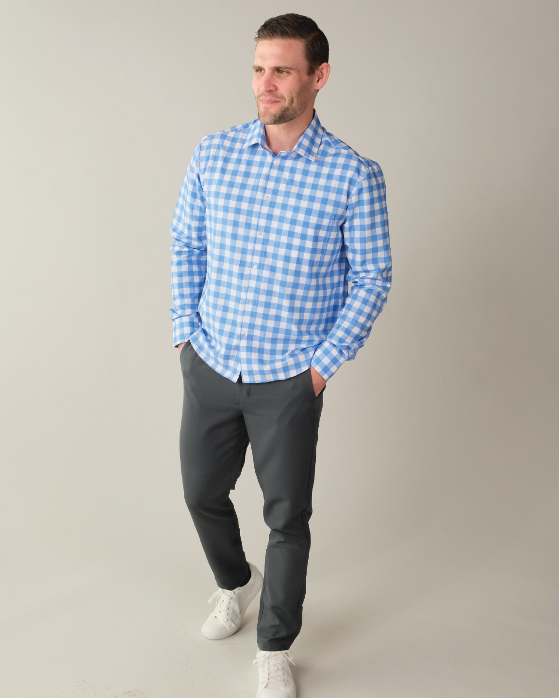 Man wearing ocean Blue shirt with White Large Gingham