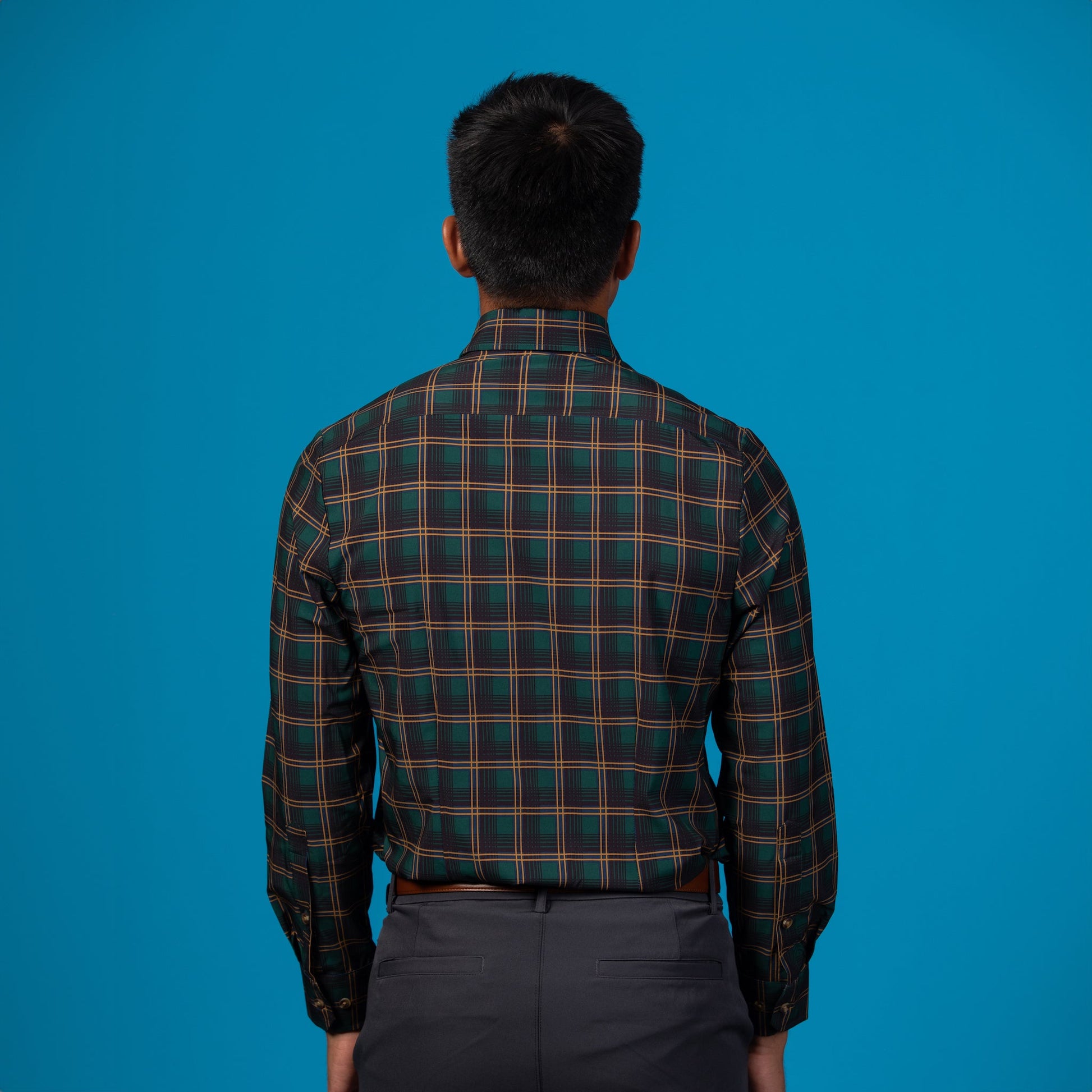 Man wearing Forest Green w/ Burnt Orange and Black Accent