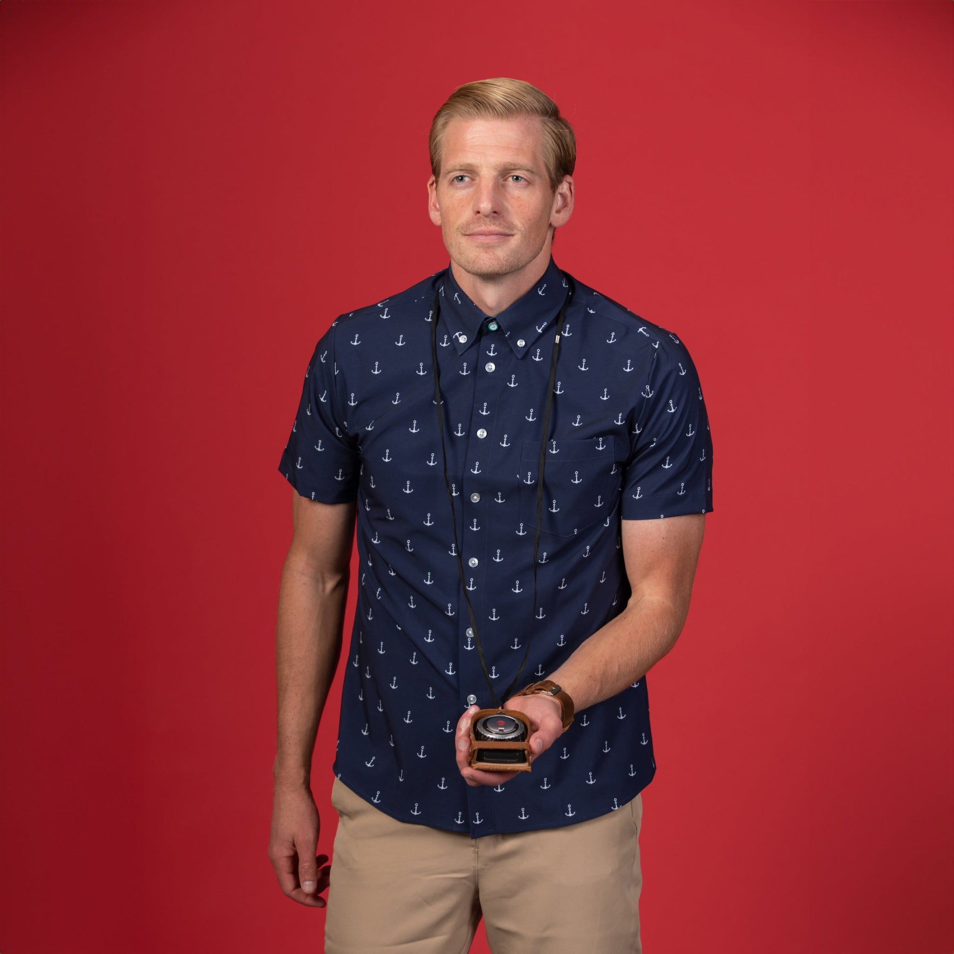 Man wearing Navy shirt with white anchors