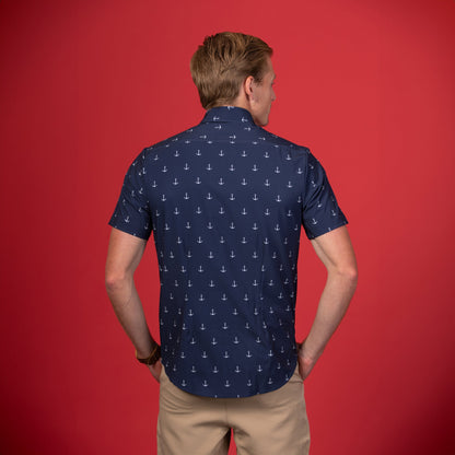 Man wearing Navy shirt with white anchors